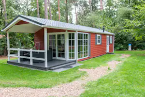 Vakantiedorp De Jutberg - Mobilheim vom Campingplatz mit Veranda im Grünen