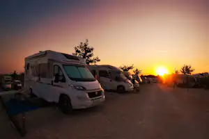 Camper Park Playas de Luz - Sonnenuntergang über den Standplätzen