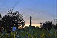 Camping -Am Leuchtturm- - Blick auf den Campingplatz bei Sonnenuntergang