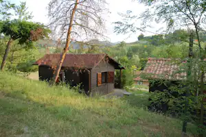 Camping Arizona - Mobilheime vom Campingplatz mit Blick auf den Wald