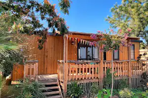 Camping Au Paradis des Campeurs - Mobilheim mit Terrasse auf dem Campingplatz