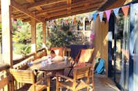 Camping Au Paradis des Campeurs  - Mobilheim mit Terrasse auf dem Campingplatz