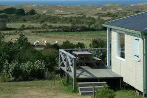 Camping Bel Sito - Chalet mit Veranda auf dem Campingplatz