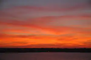 Camping Bellevue Mer - der Sonnenuntergang über dem Meer beim Campingplatz