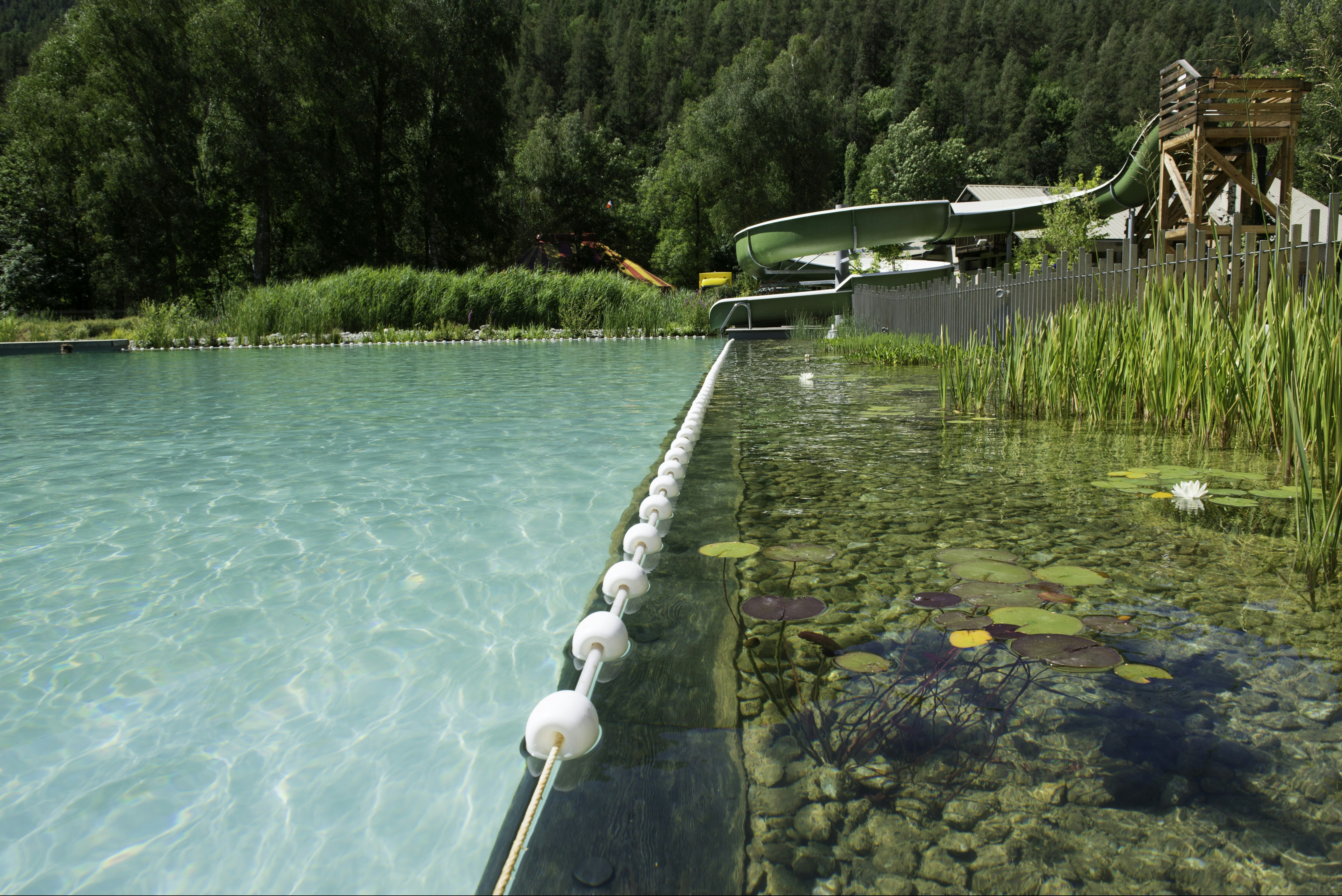 Camping Le Courounba  Campéole Le Courounba - Pool mit Rutsche auf dem Campingplatz