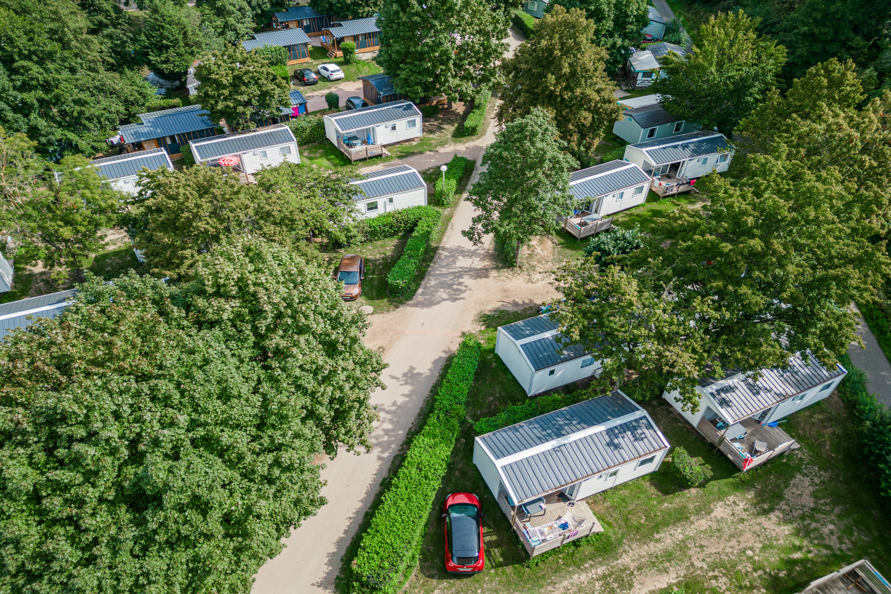 Camping Paradis Le Giessen Blick auf die Mobilheim Mietunterkünfte