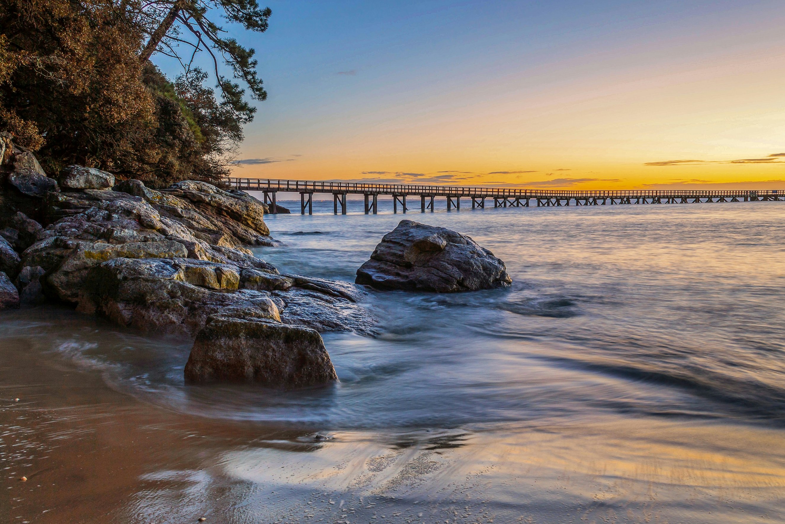 Camping Resort La Forêt - Blick auf den Strand bei Sonnenuntergang