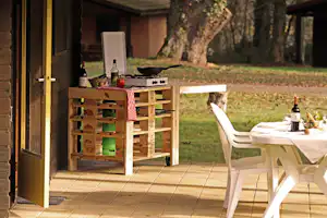 Camping Château Le Haget Terrasse eines Ferienhauses