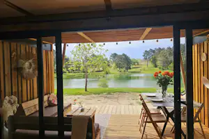 Gaia Ecolodge Camping d' Orphéo Negro - Blick von der Terrasse eines Mobilheims aus