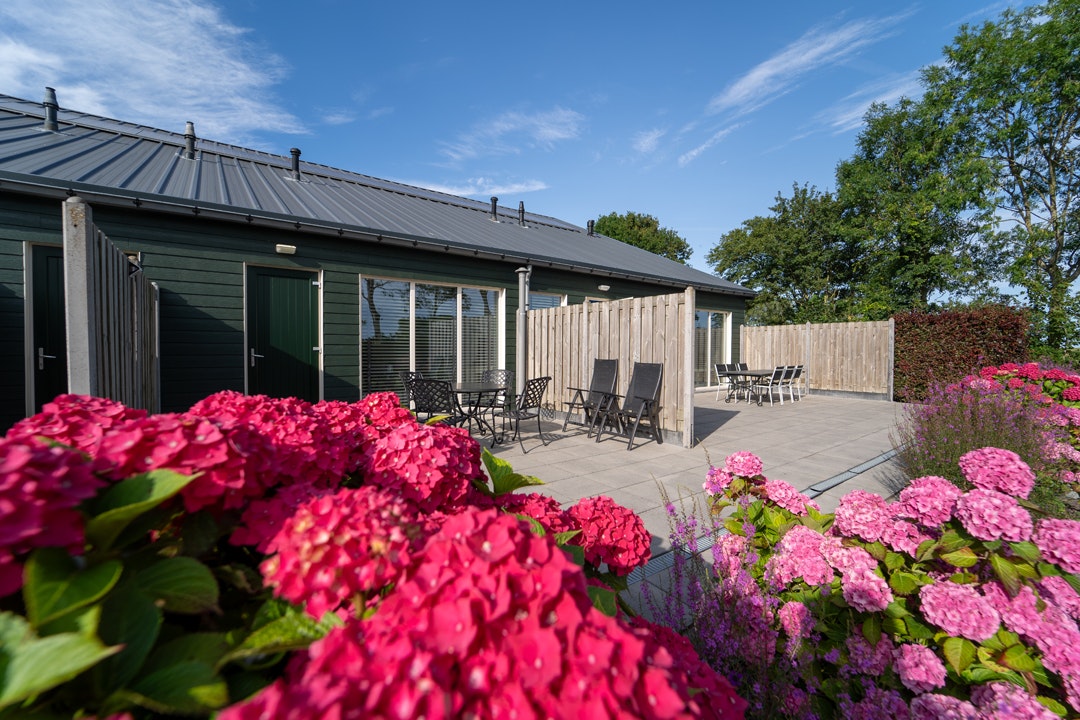 Camping De Couter - Mobilheime Außenansicht Terrasse