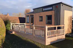 Camping de Grienduil - Mietunterkunft mit Terrasse