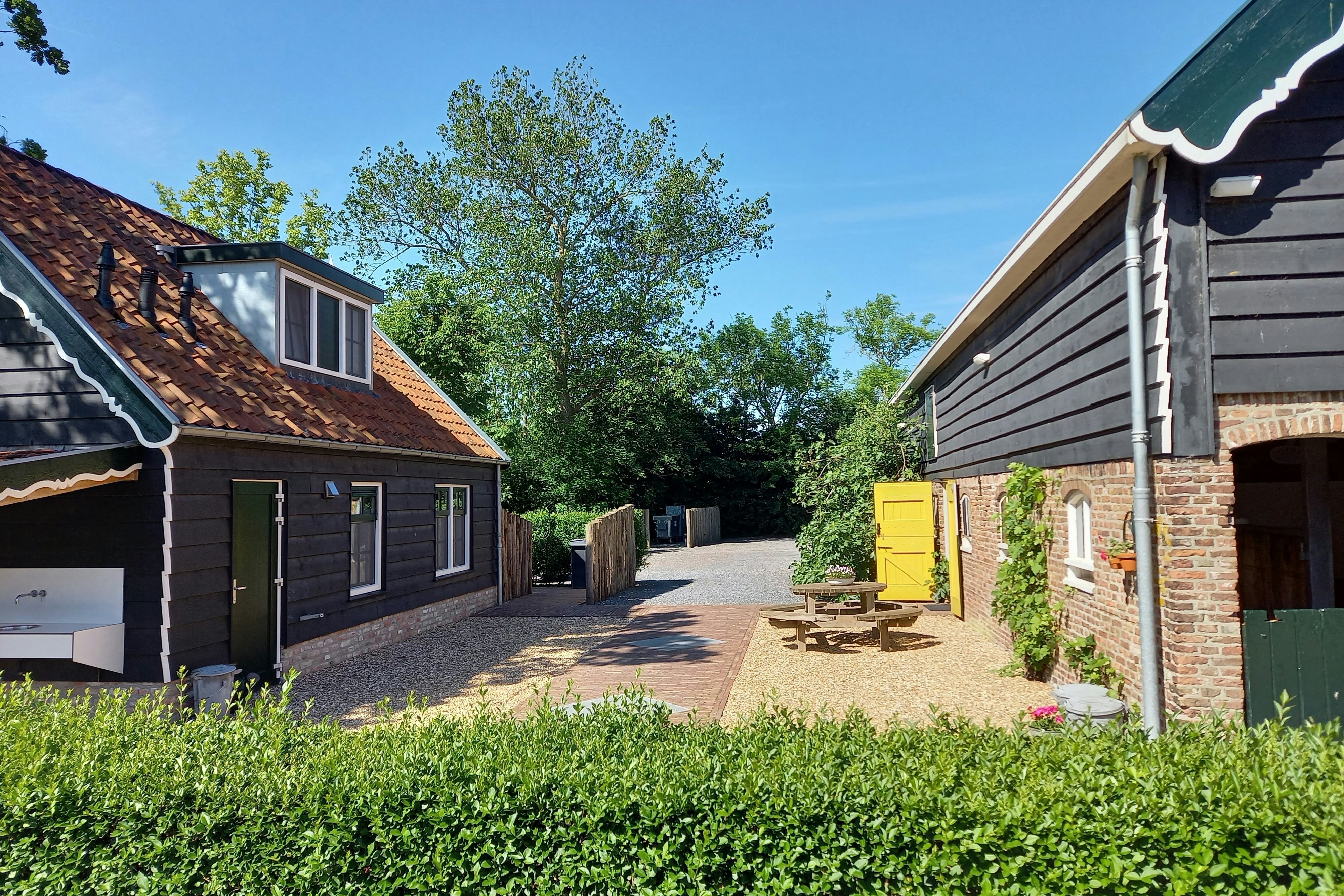 Camping De Hofwei - Außenansicht des Sanitärgebäudes