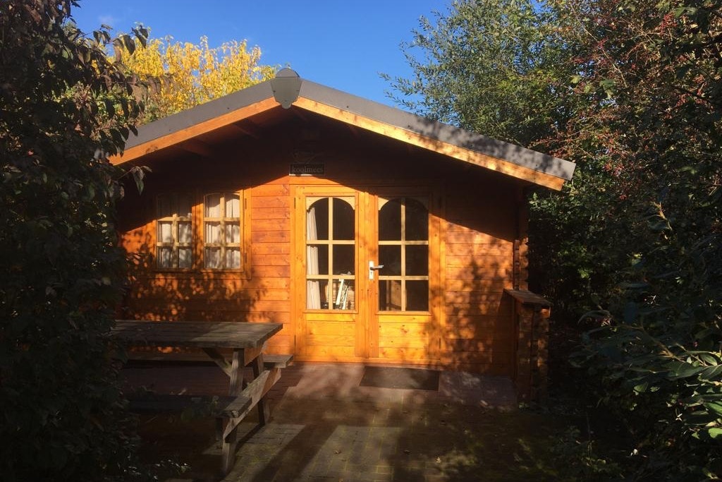 Camping de Peelpoort  - Mobilheim mit Terrasse auf dem Campingplatz