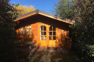 Camping de Peelpoort - Mobilheim mit Terrasse auf dem Campingplatz