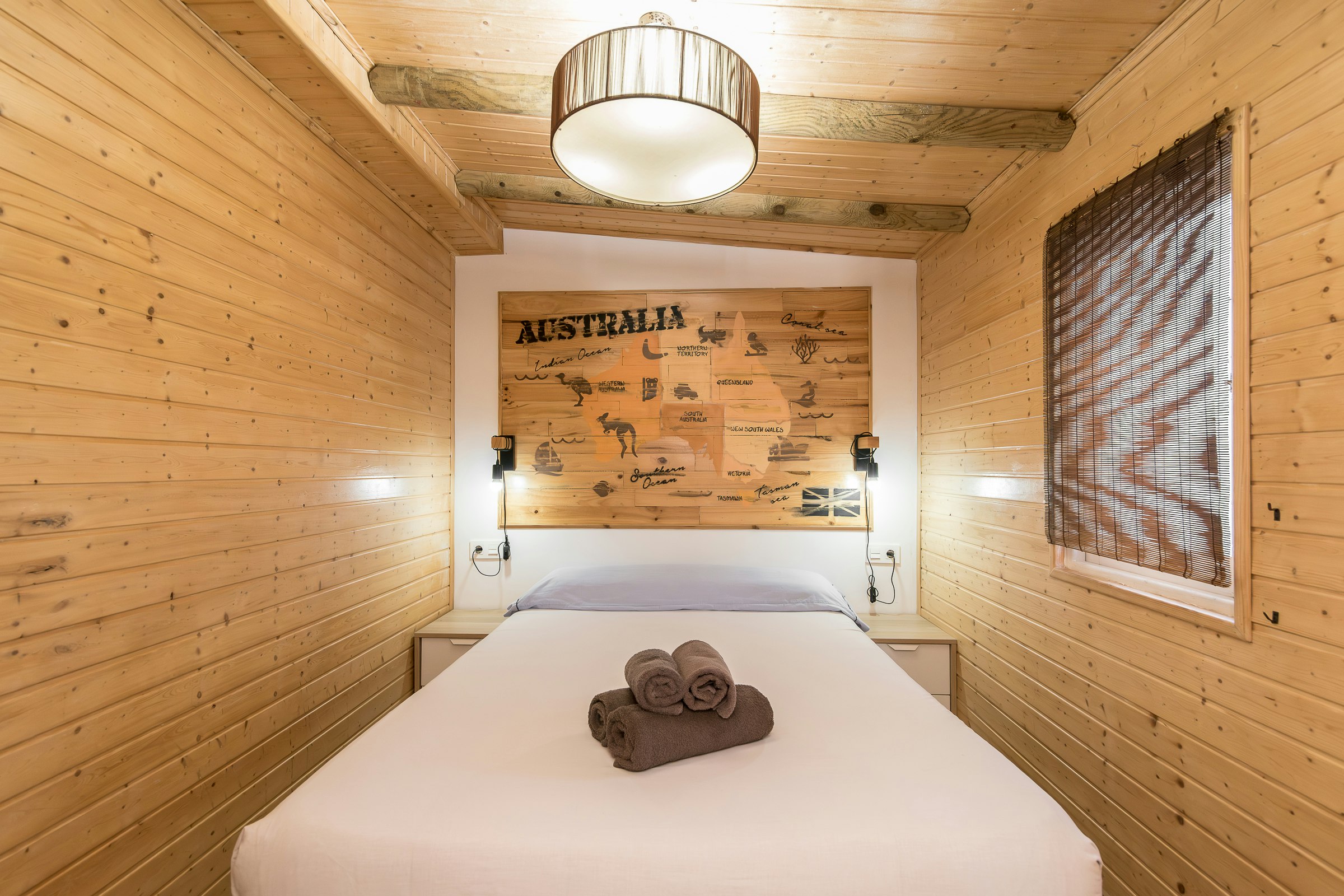 Camping Didota  - Doppelbett im Schlafzimmer eines Mobilheims