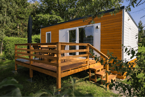 Camping Drusus - Mobilheim mit Terrasse auf dem Campingplatz