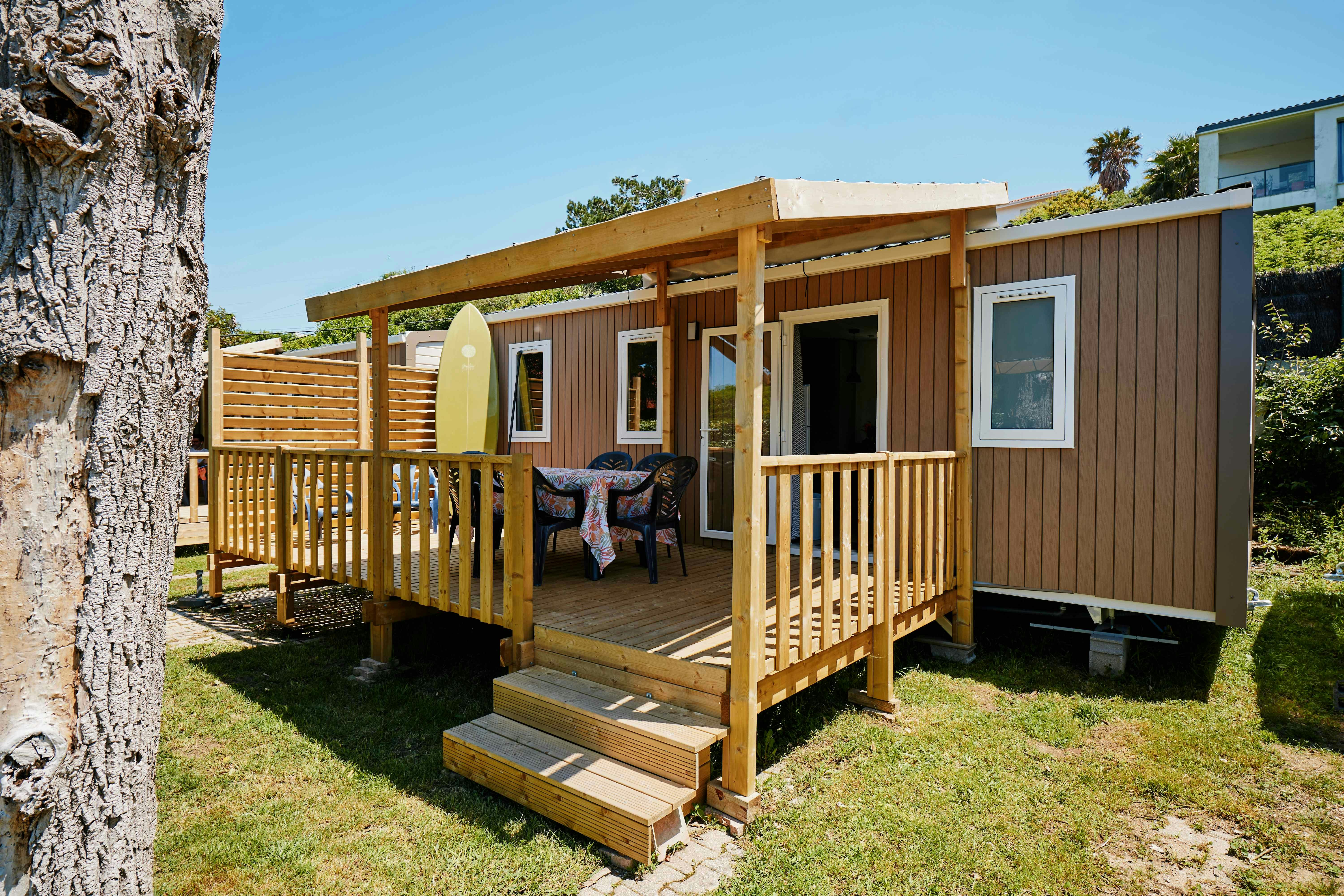 Camping Duna Munguy  - Mobilheim mit Terrasse auf dem Campingplatz