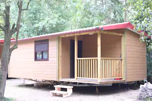 Camping El Molino - Mobilheim mit Veranda auf dem Campingplatz