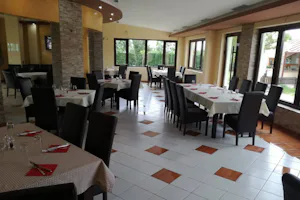 Camping Enigma - Essensraum des Restaurants innen