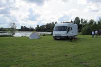Camping Ezerkrasts -  Campingbereich für Zelte und Wohnwagen am Wasser