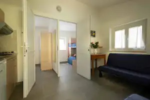 Camping Villaggio Gilda Camping Gilda - Innenansicht eines Mobilheims mit Küche