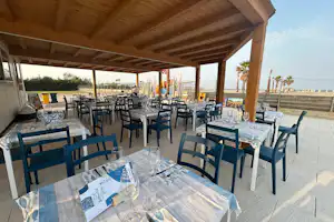 Camping Grande Italia - Restaurant mit Terrasse auf dem Campingplatz