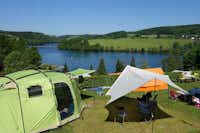 Camping Gut Kalberschnacke  -  Zeltplatz vom Campingplatz mit Blick auf den Fluss Lister