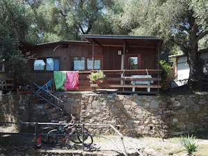Camping Il Persiano - Mobilheim mit Terrasse im Grünen auf dem Campinglatz