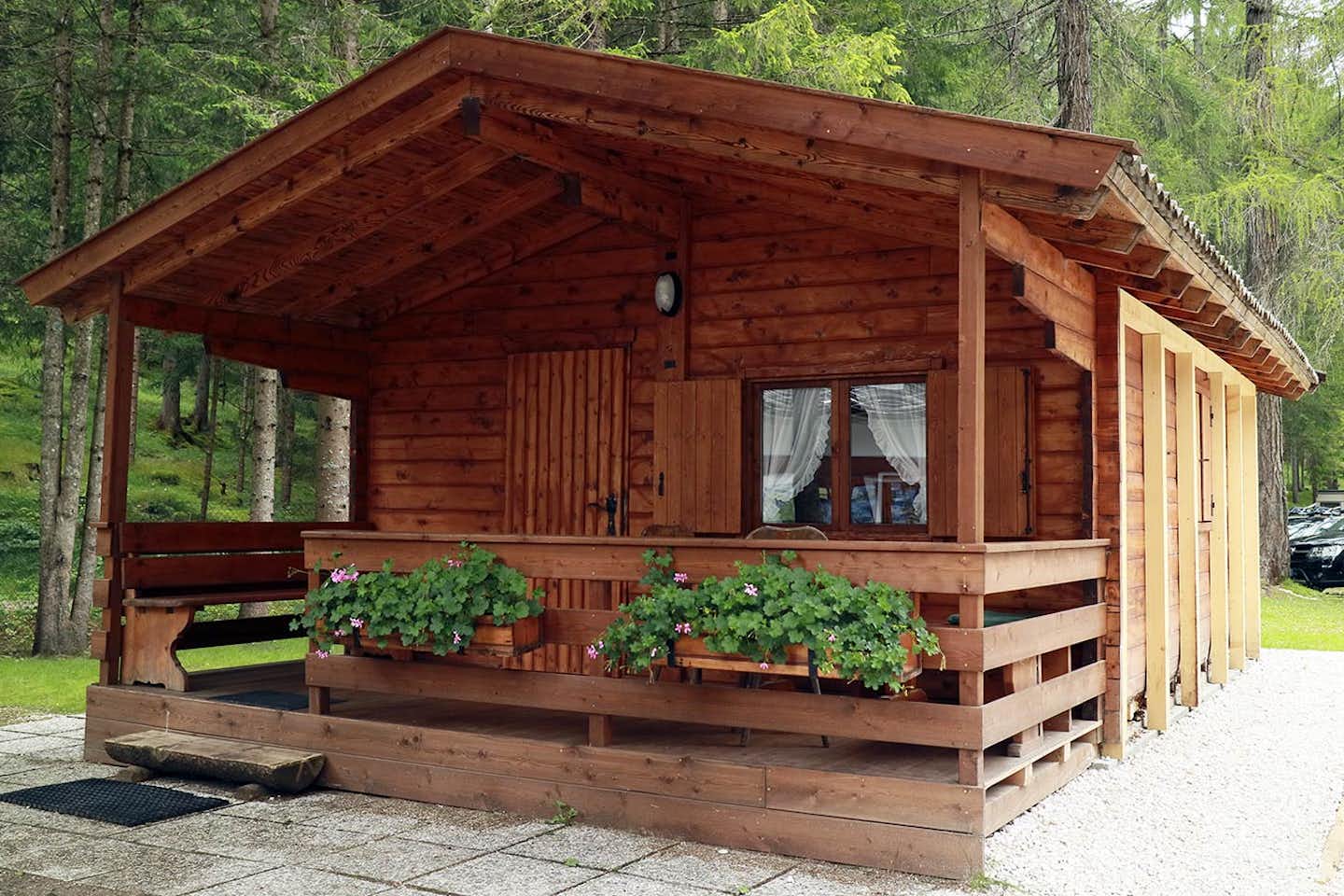 Camping International Olympia - Ferienhütte mit überdachter Veranda
