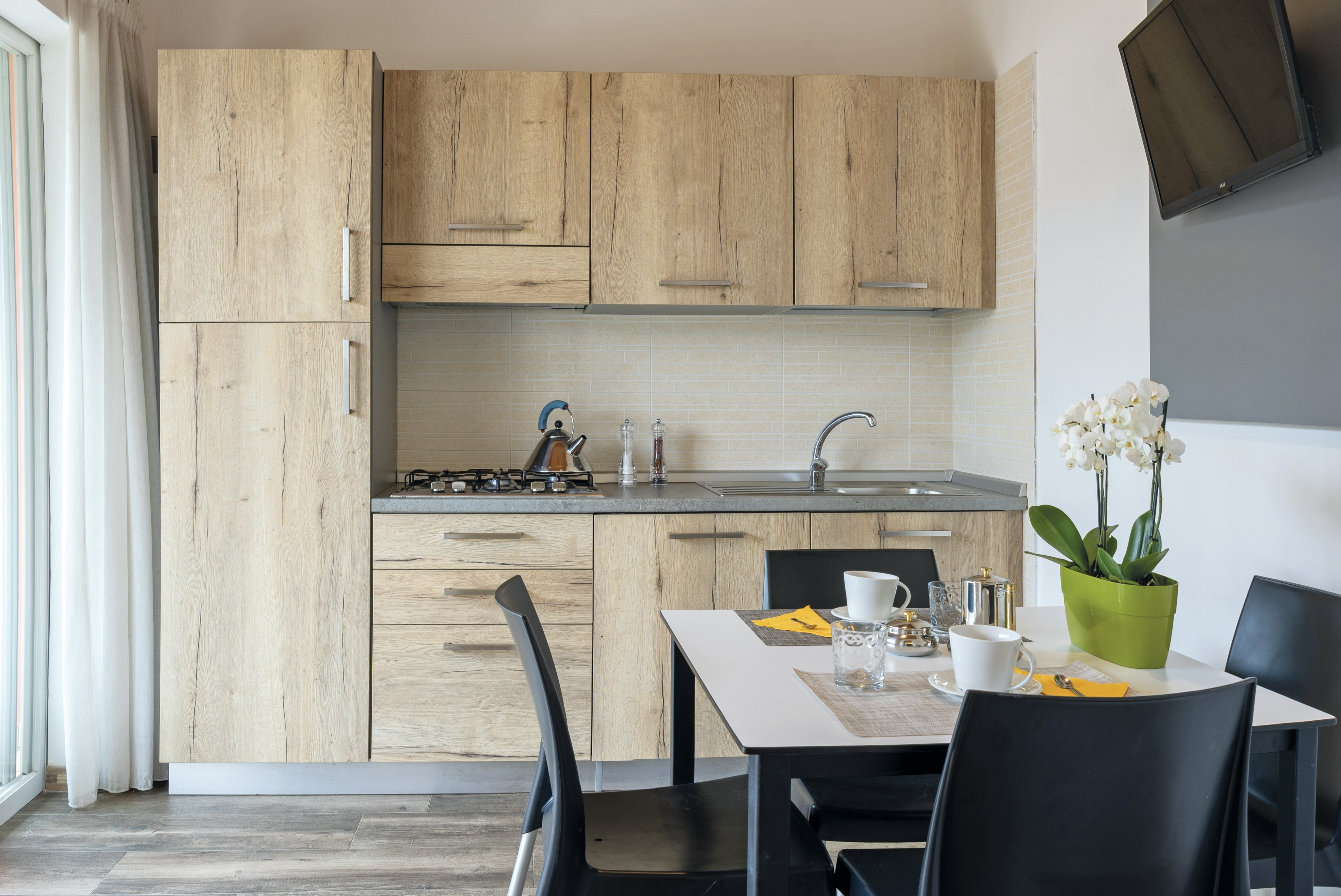 Camping Village Internazionale  - Küchenzeile in einem Mobilheim