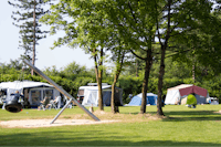 Camping Kom-es-an - Stellplätze im Grünen