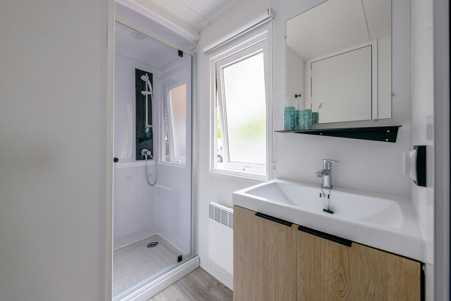 Camping L’Arbre d’Or  Camping L' Arbre d'Or - Badezimmer in einem Mobilheim