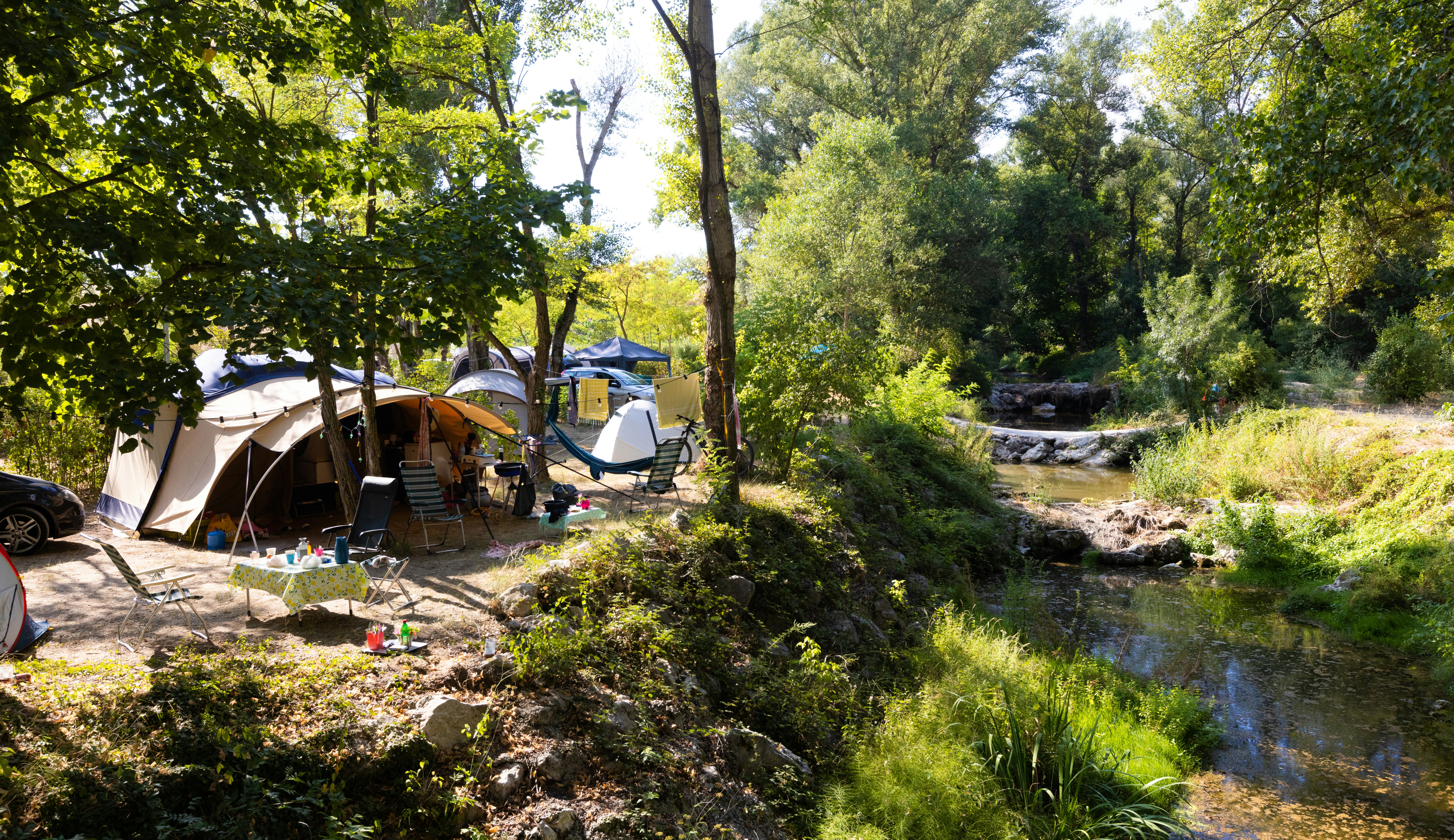 Camping L' Eau Vive  Camping Au Tylo Soleil - Standplätze auf dem Campingplatz