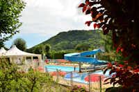 Camping L' Europe - Swimmingpool mit Wasserrutsche auf dem Campingplatz