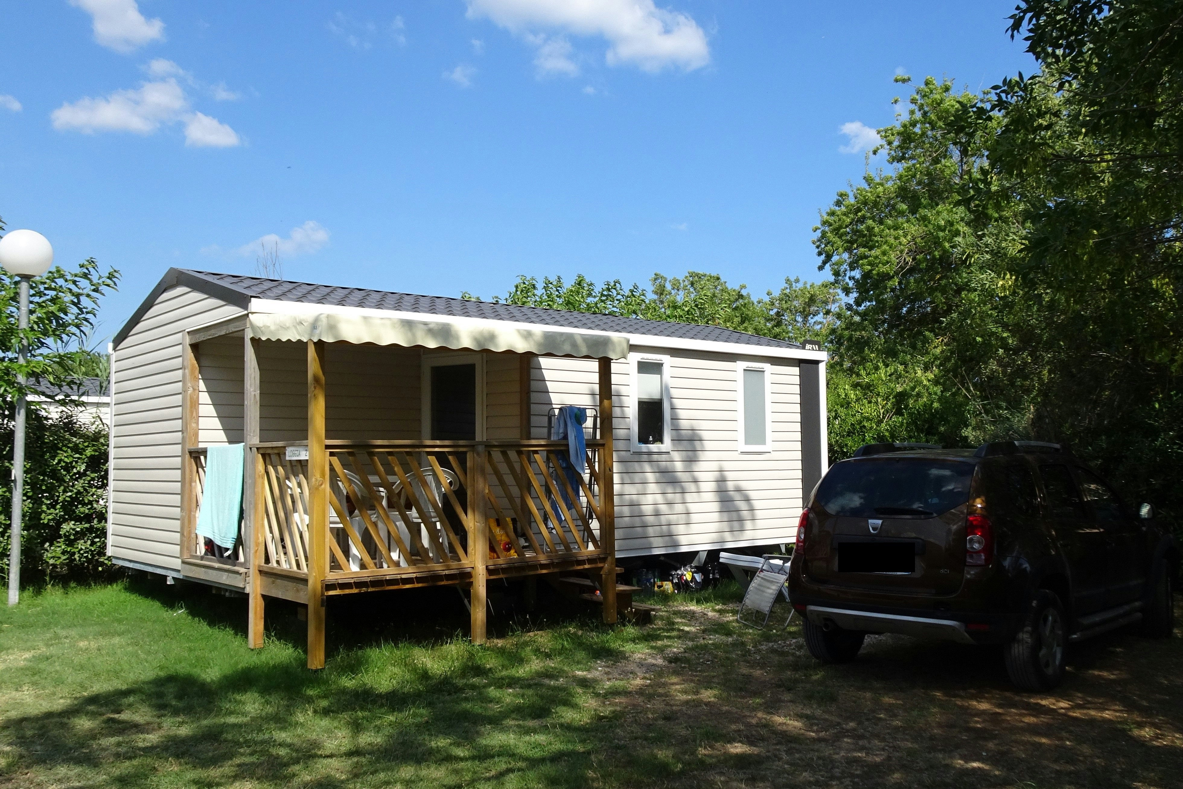 Camping La Pépinière  - Mobilheim mit Terrasse auf dem Campingplatz