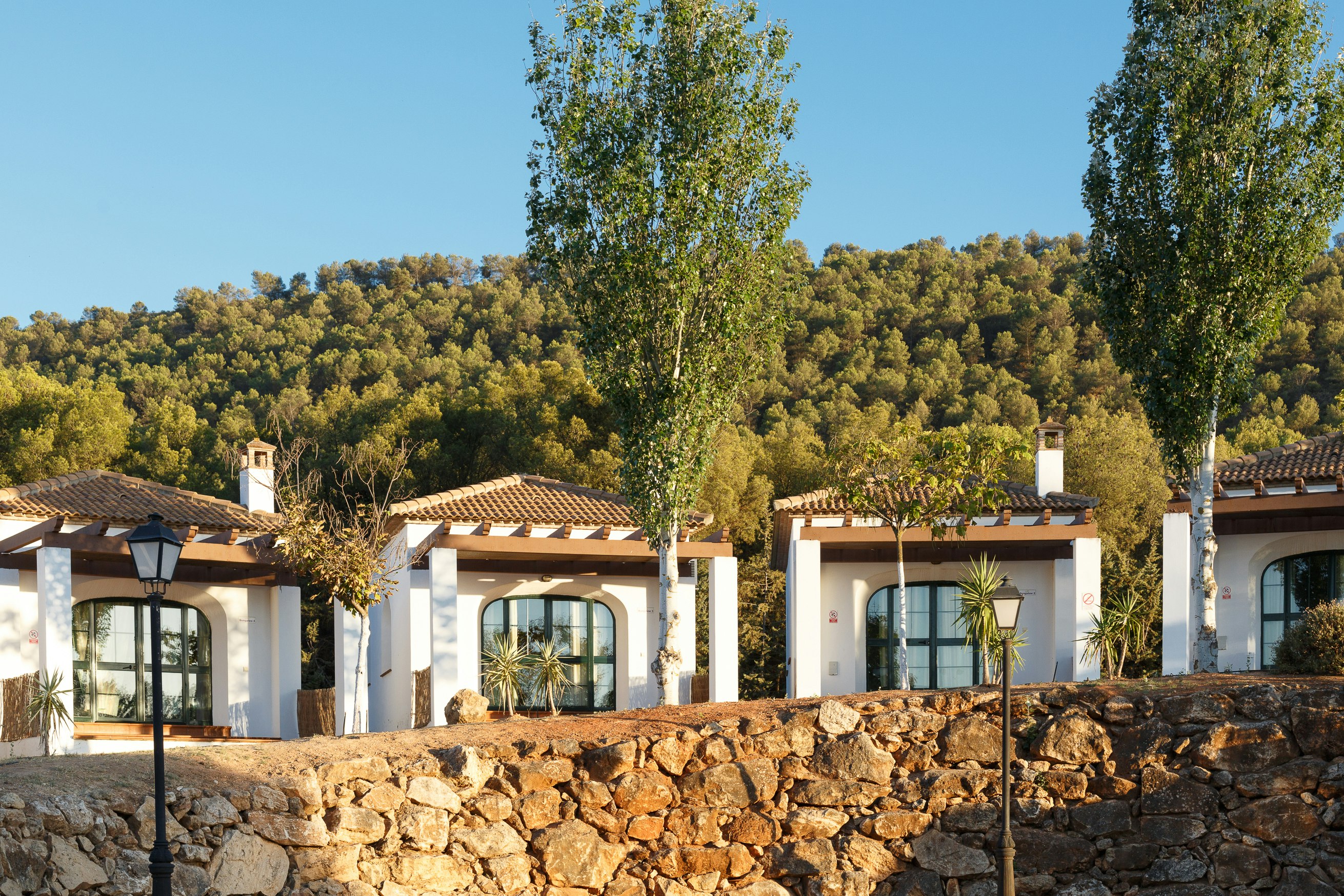 Camping La Sierrecilla - Luxus-Haus mit Veranda auf dem Campingplatz