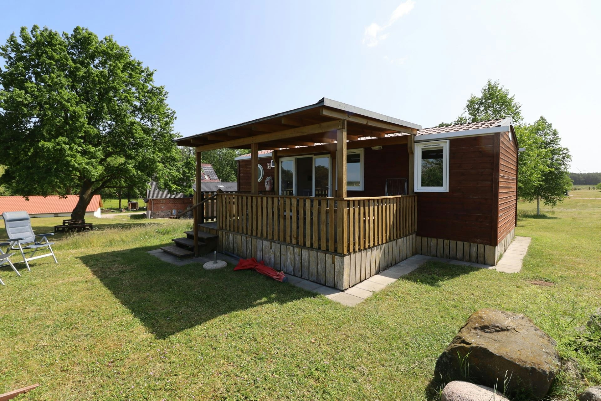 Camping Landgoed Voigtsmühle  - Mobilheim mit Terrasse auf dem Campingplatz