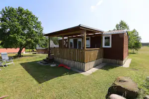 Camping Landgoed Voigtsmühle - Mobilheim mit Terrasse auf dem Campingplatz