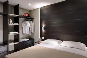 Camping Le Calanchiole - Schlafzimmer einer glamping Lodge