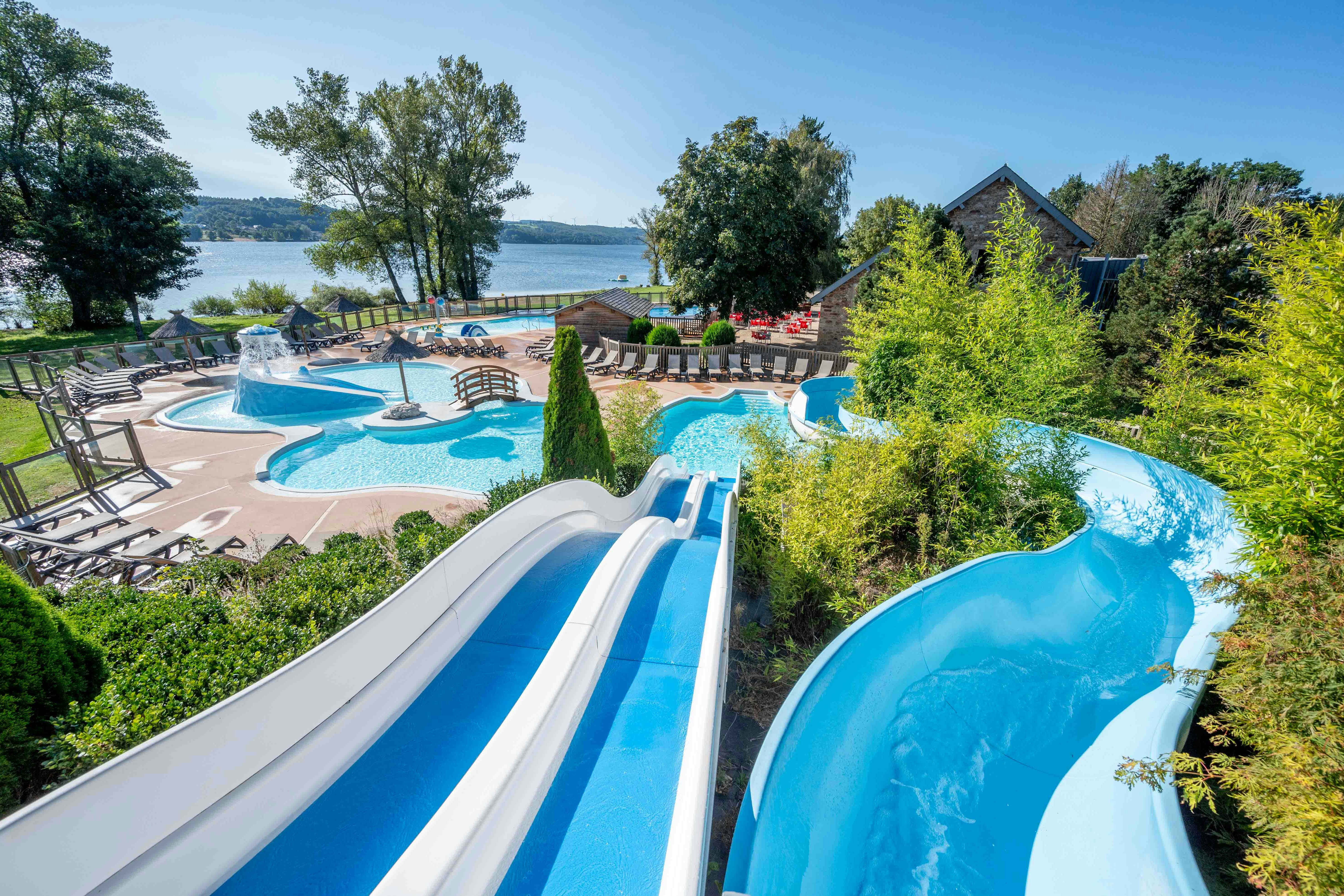 Camping Koawa Le Caussanel  Camping Le Caussanel - Ciela Village  - Rutschen im Wasserpark des Campingplatzes