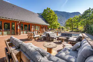 Camping Koawa Le Colporteur Camping Le Colporteur - Ciela Village - Restaurant mit Terrasse auf dem Campingplatz