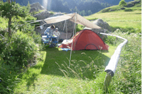 Camping Le Grand Saint Bernard -  Zeltstellplatz im Grünen auf dem Campingplatz