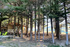 Camping Le Matin Calme - Mobilheim mit Veranda auf dem Campingplatz