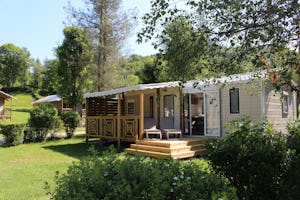 Camping Le Moulin de Serre - Mobilheim vom Campingplatz mit Veranda