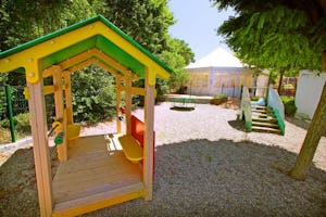 Camping Le Moulin de Sainte Anne Camping Le Moulin de Ste. Anne - Kinderspielplatz auf dem Campingplatz