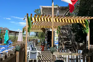 Flower Camping Le Moulin des Iscles - Eingang zum Plan