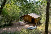 Camping Le Pech Charmant - Blick auf eines der Mobilheime auf dem Campingplatz