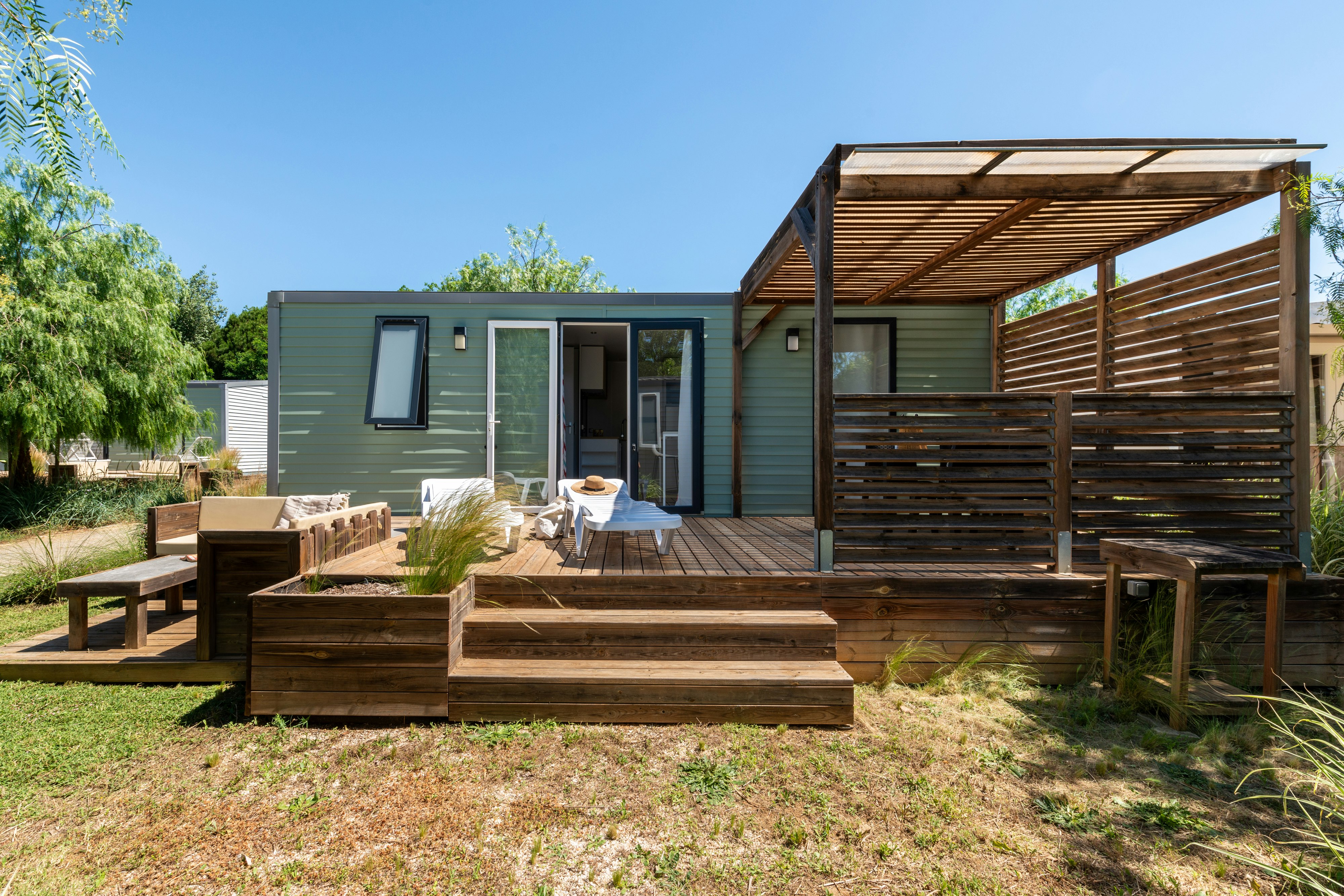 Flower Camping Le Rochelongue  - Mobilheim mit Terrasse auf dem Campingplatz