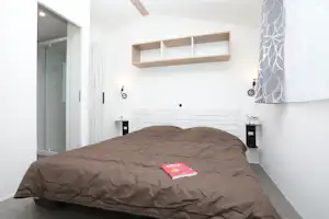 Camping Le Val de Trie - Doppelzimmer eines Mobilheims