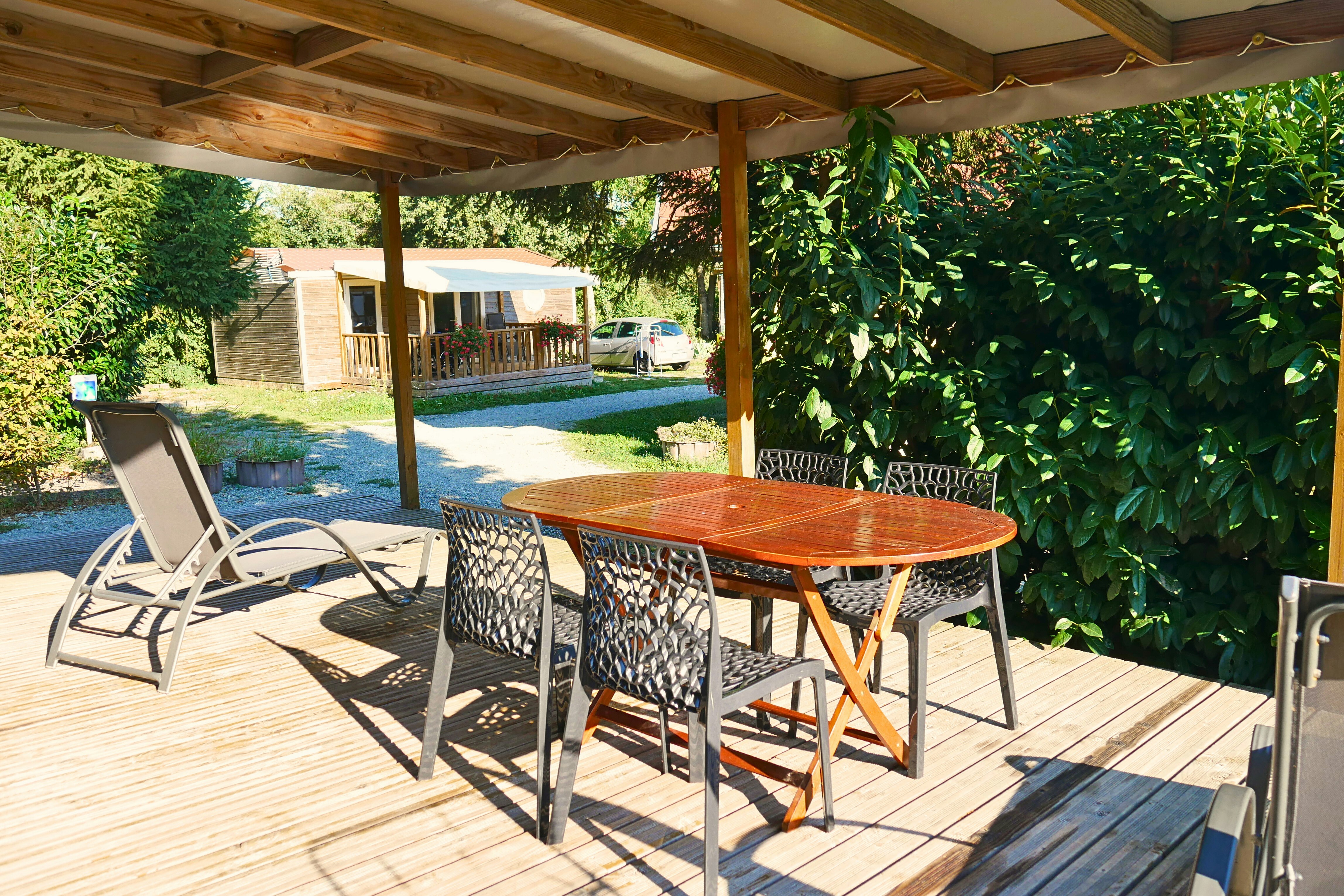Camping Les Castors - Terrasse eines Mobilheims